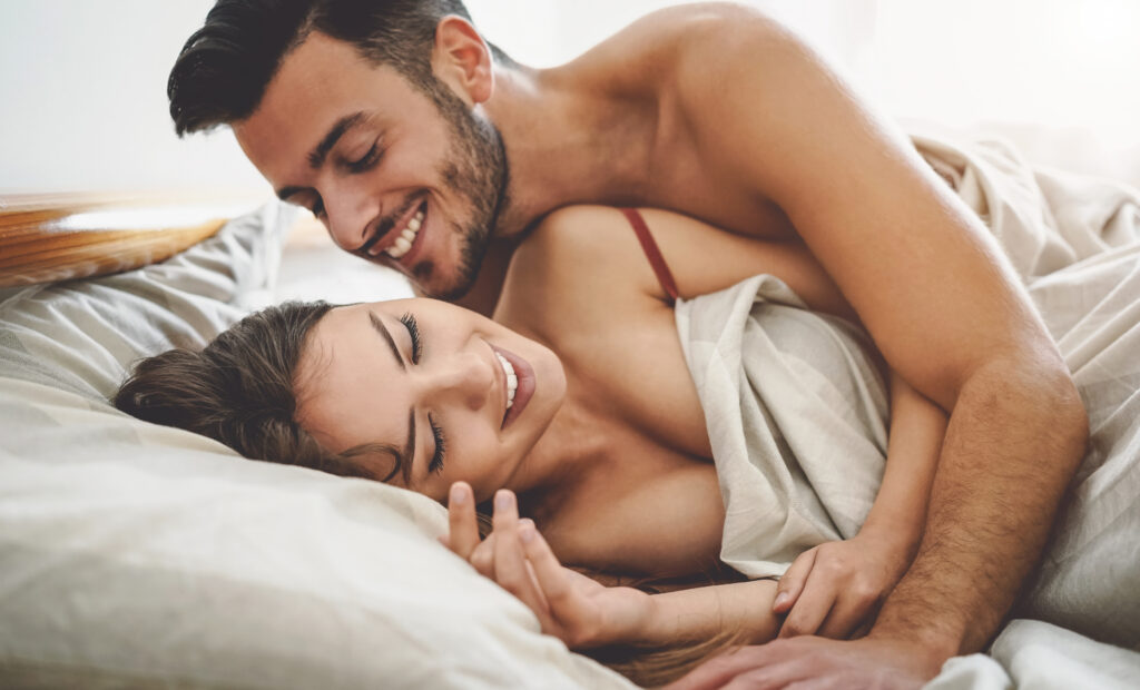 Man and woman in bed after ED treatment with Shockwave Therapy in Los Angeles, CA
